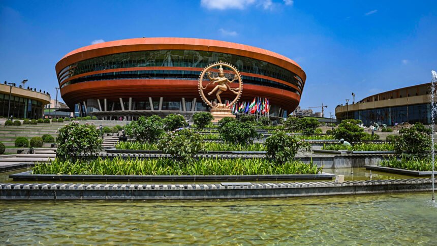 Flag of India flying at a diplomatic summit in New Delhi.